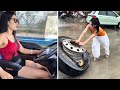 Female Truck Driver Taotao Faces Tire Breakdown in the Rain While on the Job