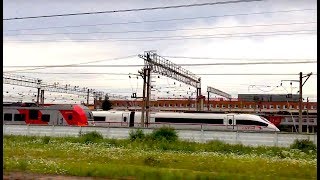 RZD RUSSIA 'Sapsan' speeds through famous town of Kalashnikovo and its busy yard