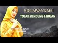 tolak mendung dan hujan