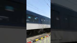 The crossing gate goes up after rapid express train of the Keihan passes the crossing.