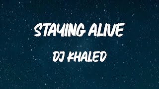 DJ Khaled - STAYING ALIVE (feat. Drake & Lil Baby) (Lyric Video)