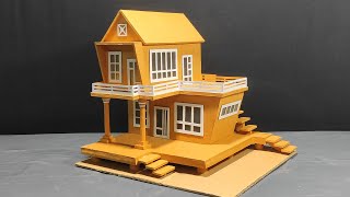 Modern miniature cardboard house.