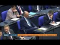 bundestag generaldebatte im wahlkampf endspurt heftiger schlagabtausch zwischen scholz und merz