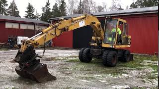 Köp Hjulgrävare Cat 206 med tiltrotator och redskap på Klaravik