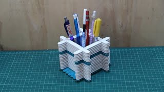 Make a pencil holder from popsicle sticks