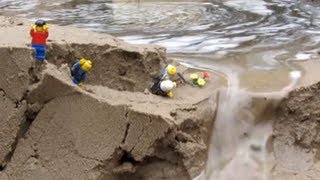 Dam breach:  lego men in danger by the flood...
