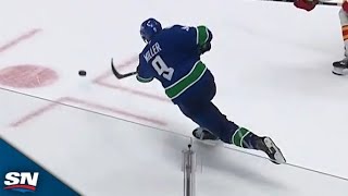 Canucks' J.T. Miller Wires Home Game-Tying Goal After Quinn Hughes Blocks Empty Netter