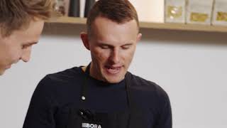 Rafal Majka learns German in the BORA - hansgrohe kitchen