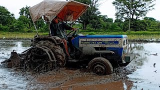 swaraj 724 xm orchard puddling with rotavator