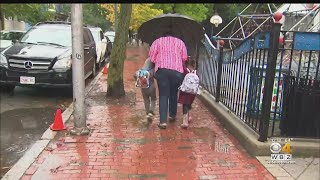 Students get rainy start to the new school year in Cambridge