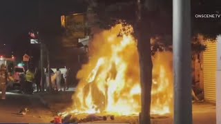 Cars collide, catch fire on South LA sidewalk