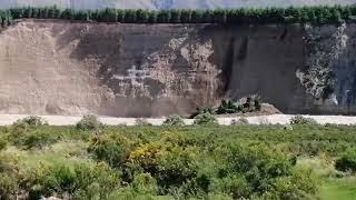 Cliff Section Tumbles Into River After Heavy Rainfall and Flooding in Canterbury