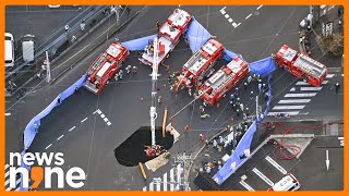 Japan | Truck Falls Into Massive Sinkhole in Japan | Driver Trapped \u0026 Rescue Underway | News9