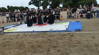 Young women demonstrate calligraphy skills, Niihama Taiko Festival, Yamane Park, Shikoku, Japan