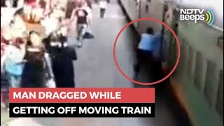 Man Dragged While Getting Off Moving Train In Shocking Video