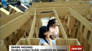 Students built 19 houses using cardboard paper