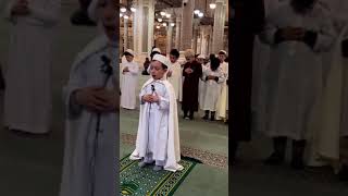 A Cute Kid Leading Prayer : Friends are at his back to offer the prayer