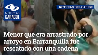 Menor que era arrastrado por arroyo en Barranquilla fue rescatado con una cadena humana