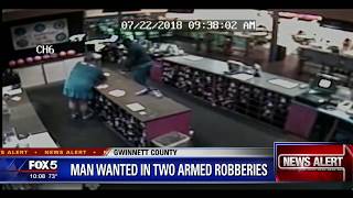 Man wanted in two armed robberies