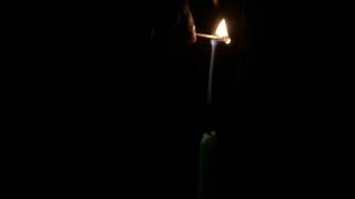 Lighting a candle with wax vapour (Slo-mo)