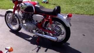 Red Triumph Bonneville and Honda super Hawk cb77