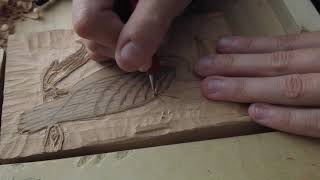 Hand carving a woodblock for printmaking