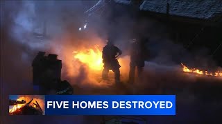 Heavy flames engulf 5 homes in Allentown, Pa.