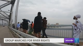 Dozens walk across Centennial Bridge for 'Walk for River Rights' rally