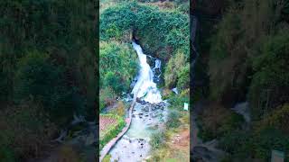 Natural mountain spring water flows out quickly in the cave