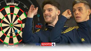"No chance!" | Leandro Trossard calls for VAR in darts challenge against Declan Rice 😂