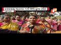 shg ladies block road in koida demanding proper construction of roads