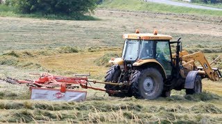 Rotary Hay Rake - Kuhn 4221 GTH and AGCO Challenger ML78 Tractor