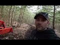 clearing trails with a compact tractor