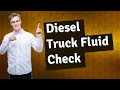 How do you check the transmission fluid on a diesel truck?