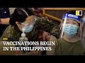 Philippines starts long-delayed Covid-19 vaccination programme using free Chinese Sinovac jabs