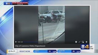 BREAKING: Viral video shows Lawrence police punch man during arrest in Walmart parking lot. Here's w