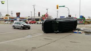 Two-Vehicle Collision on McPhillips St. Traffic light is knocked down | Winnipeg