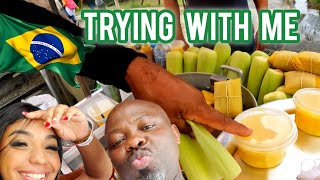 African man trying street food🇧🇷 in brazil for the first time