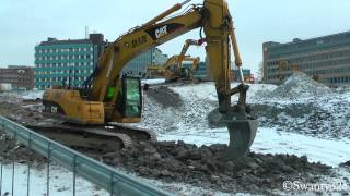 CAT 320D LRR Ripping Through Frozen Dirt