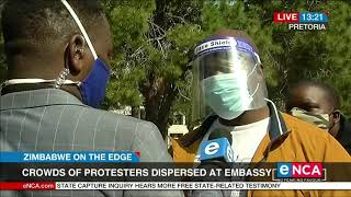 Police disperse crowds outside Zimbabwean embassy