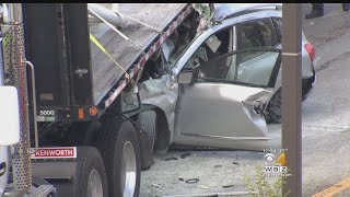 Driver Dies After Car Pinned Under Bed Of Tractor-Trailer