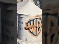 Warner bros logo but logo turned into a water tower