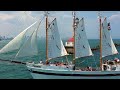 Stunning 4K Drone Footage of Tall Ship Windy passing Chicago Harbor Lighthouse, Navy Pier & Skyline