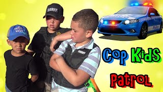 COPS AND ROBBERS - WHAT'S IN THE BOX? - COP KIDS PATROL