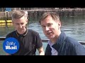 Jeremy Hunt meets a local fisherman as he campaigns in Aberdeen