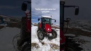 TRACTOR SLIDING ON THE SNOW