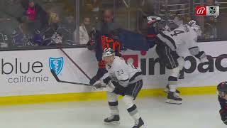 Mikey Anderson upends Kailer Yamamoto along the boards.