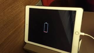 iPad Air 2 keeps turning on and off