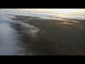 drone flight over the early morning mist of the fundy coast in new brunswick canada