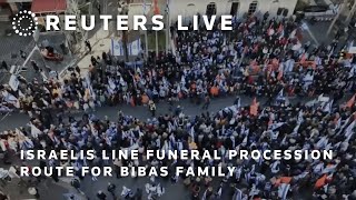 LIVE: Israelis line funeral procession route for Bibas family | REUTERS